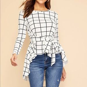 Waist belted asymmetrical hem grid top